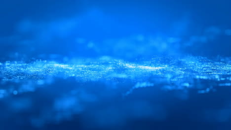 abstract blue digital particles flowing background