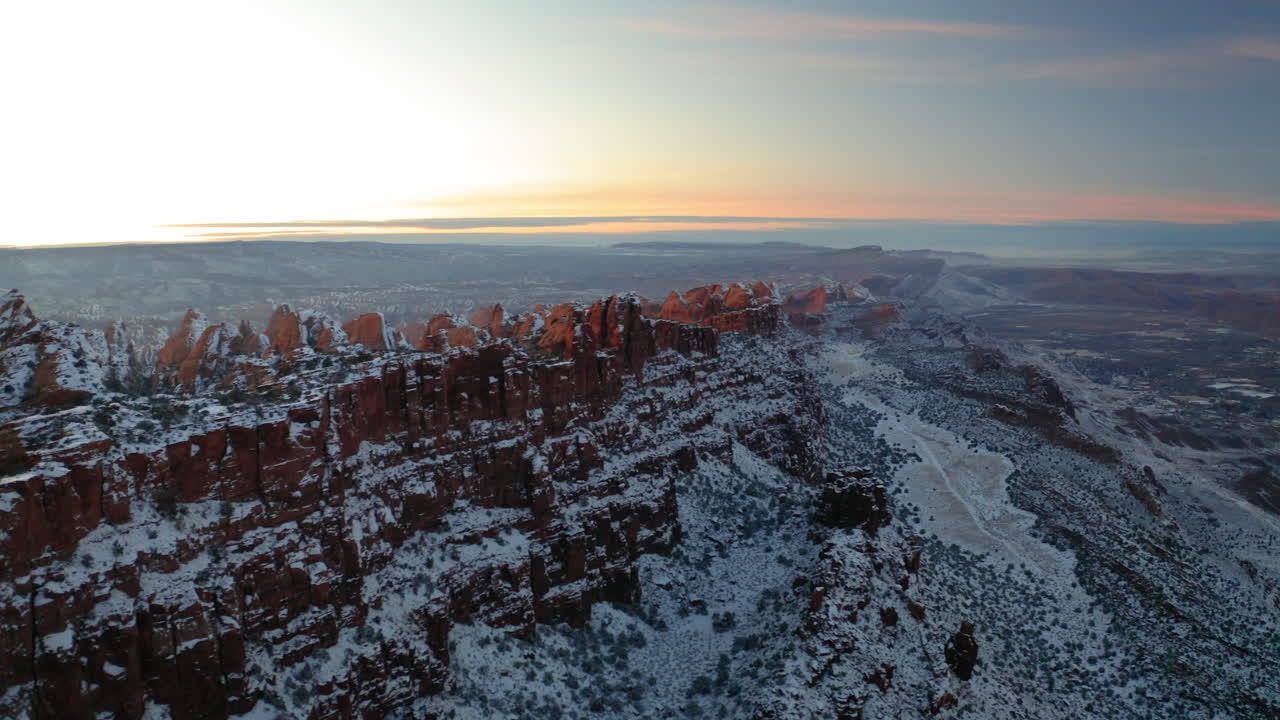 Snow-Covered Red Rock Landscape at Sunrise