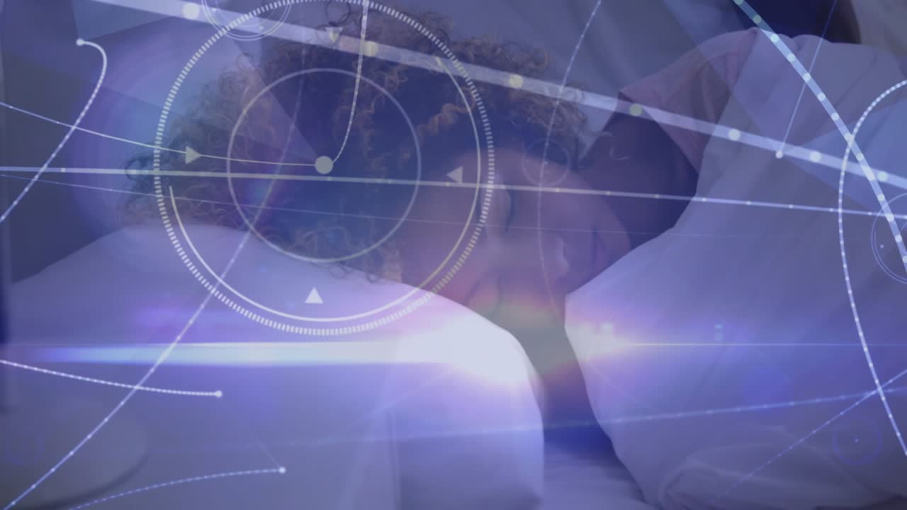 Man leaning over bed activating holographic scan mapping woman's head torso for sleep monitoring