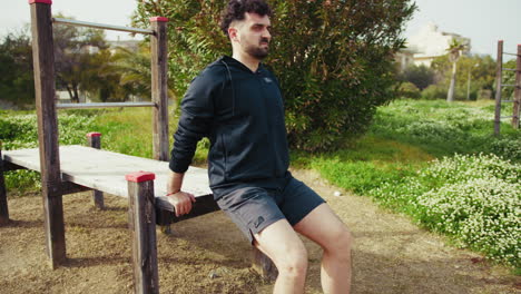 man does intense workout in the park to lose weight