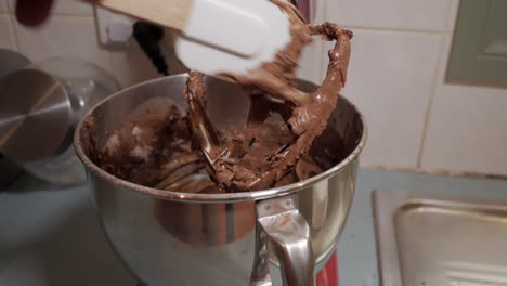 male preparing a chocolate cake