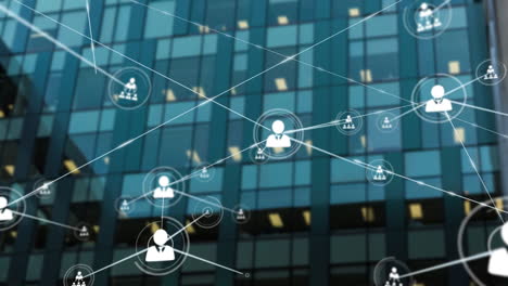 animation of network of connections with icons over modern office building