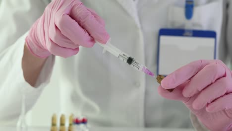Medical professional preparing a vaccine injection