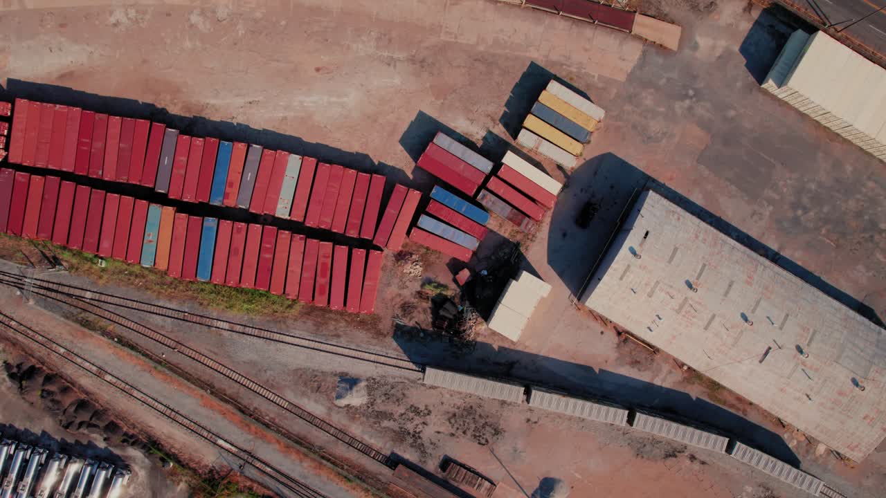 Top down aerial of shipping containers and rail tracks in Memphis Tennessee