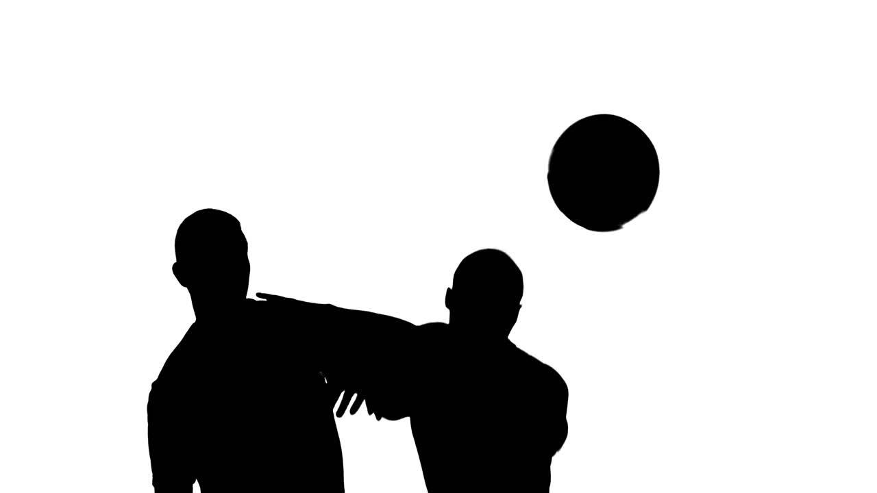 Video of black silhouettes of two male soccer players head kicking ball isolated on white background