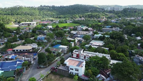 flying over legazpi city in albay, philippines - drone shot