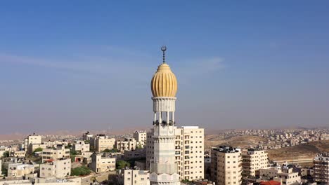 mosque tower minaret in anata refugee camp, jerusalem-aerial view