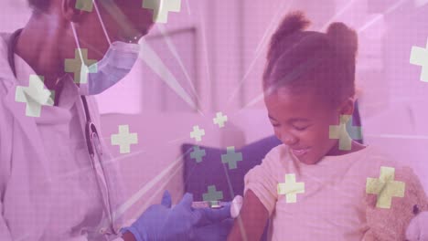 Multiple-medical-symbol-floating-against-african-american-female-doctor-giving-injection-to-a-girl