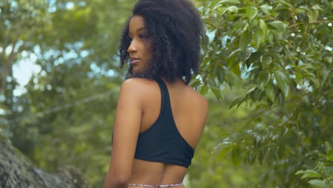 epic model footage of a young girl posing for the camera on the caribbean island of trinidad in a park setting