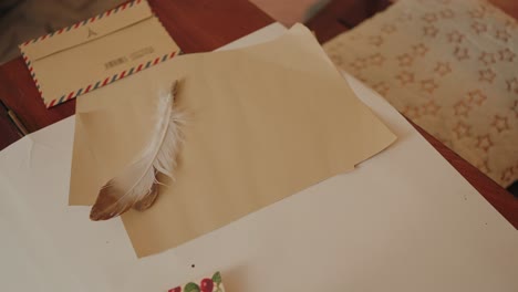 elegant vintage feather and letter stationary
