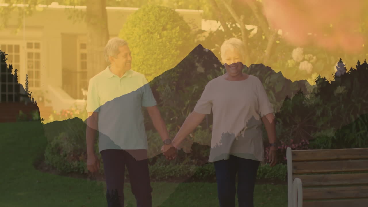 Holding hands, elderly couple with mountain animation overlay in garden