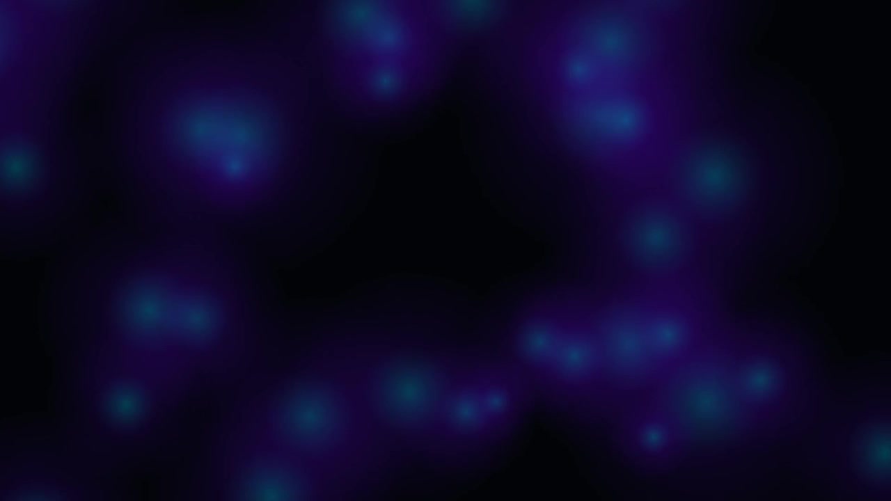 Abstract Glowing Blue Particles Expanding and Fading on Black Background