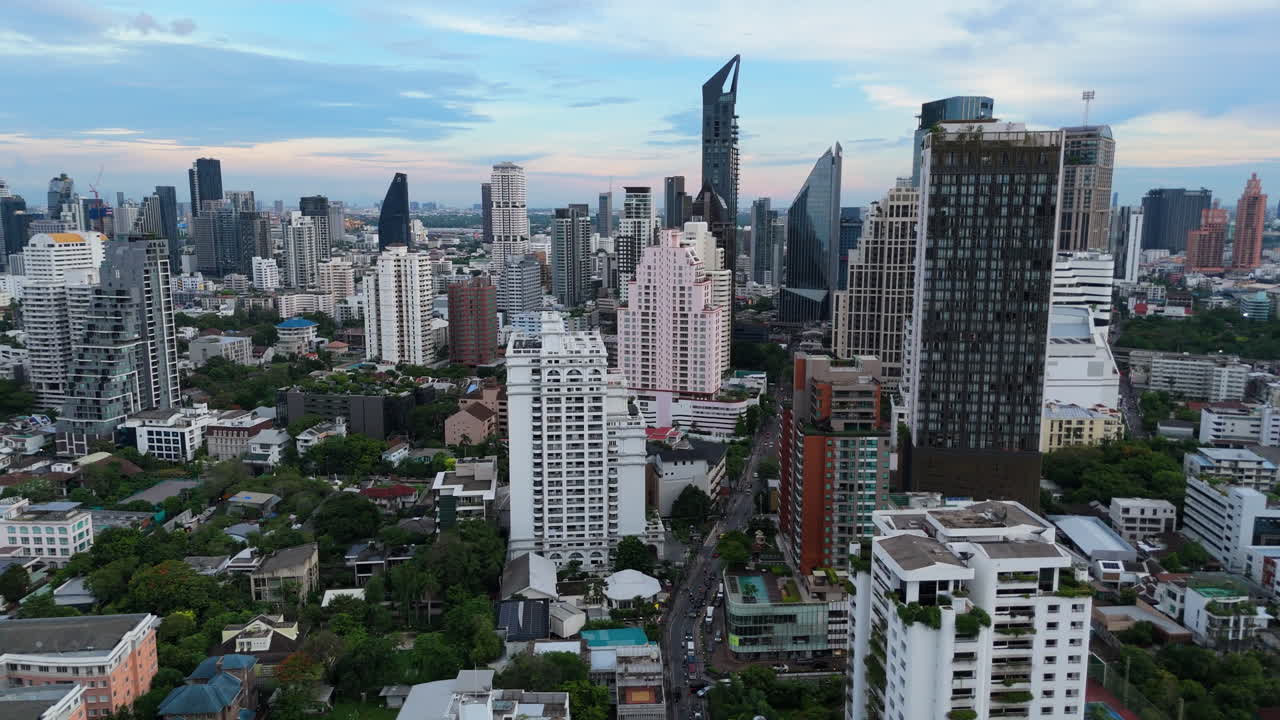 Large towering glass skyscrapers on modern urban city skyline