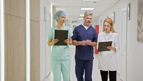 medical professionals in hospital corridor