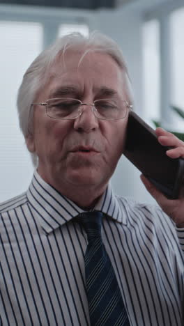 senior businessman on a phone call