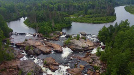 cascades over rocks near byng inlet countryside forest park in ontario, canada