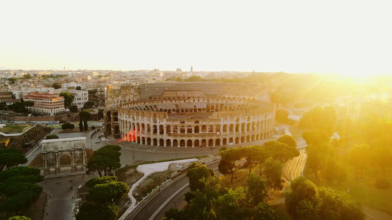 Colosseum bathed in sunrise glow evokes strength surviving centuries of upheaval