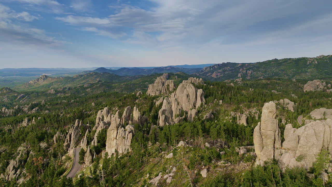 Drone view soaring above surreal rock landscapes in the western United States.