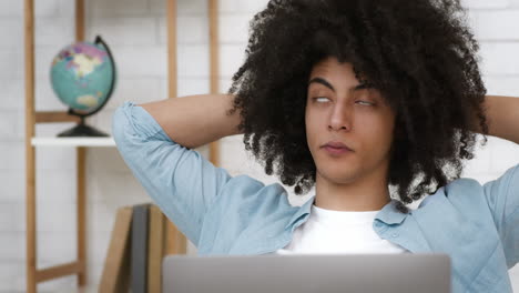 young man working on laptop