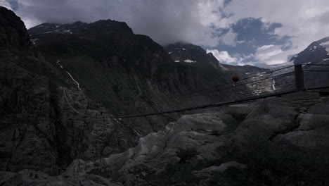 mountain suspension bridge in the alps