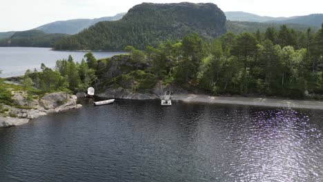 Aerial-drone-shot-of-islands,-forest-and-fjord,-Norway