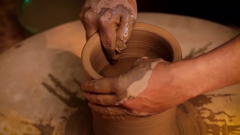 potter at work makes ceramic dishes. india, rajasthan.