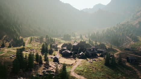 old wooden village on the rocky mountain background