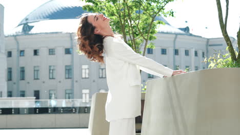 businesswoman in a white suit in the city