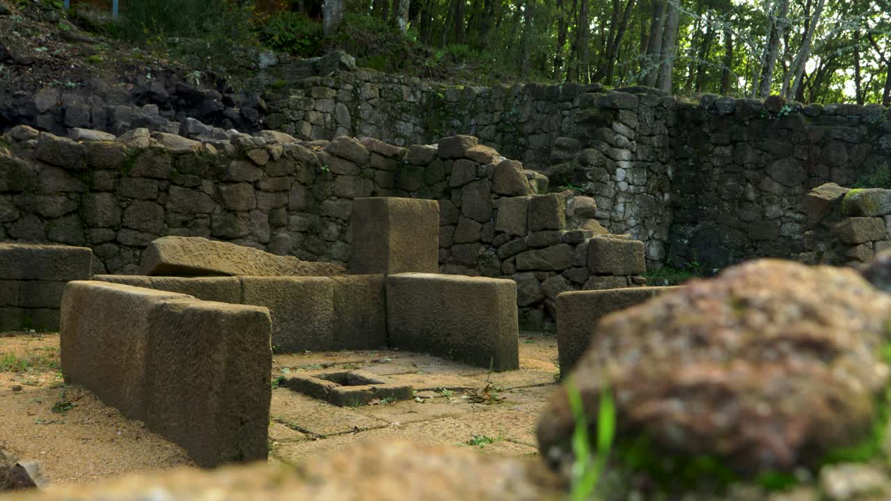 Stone structures and ruins in Castro Cibdá de Armeá archaeological site, Ourense, Galicia, Spain