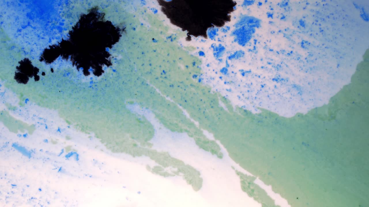 A flowing stream of pale light and deep blue reveals a dark bloom sprouting tendrils in a surreal dance