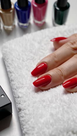 white fur rug and red nails close-up