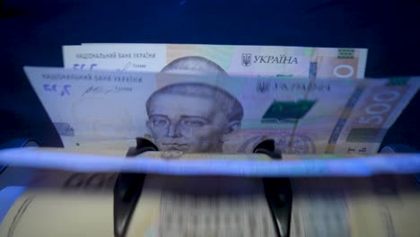 counting ukrainian hryvnia