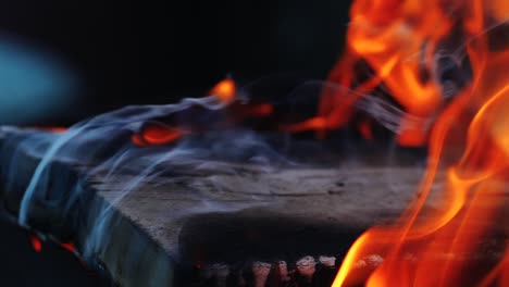 flaming and burning dangerous fire. burning firewood. slow motion