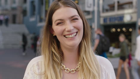 portrait of young happy blonde woman smiling confident enjoying urban lifestyle