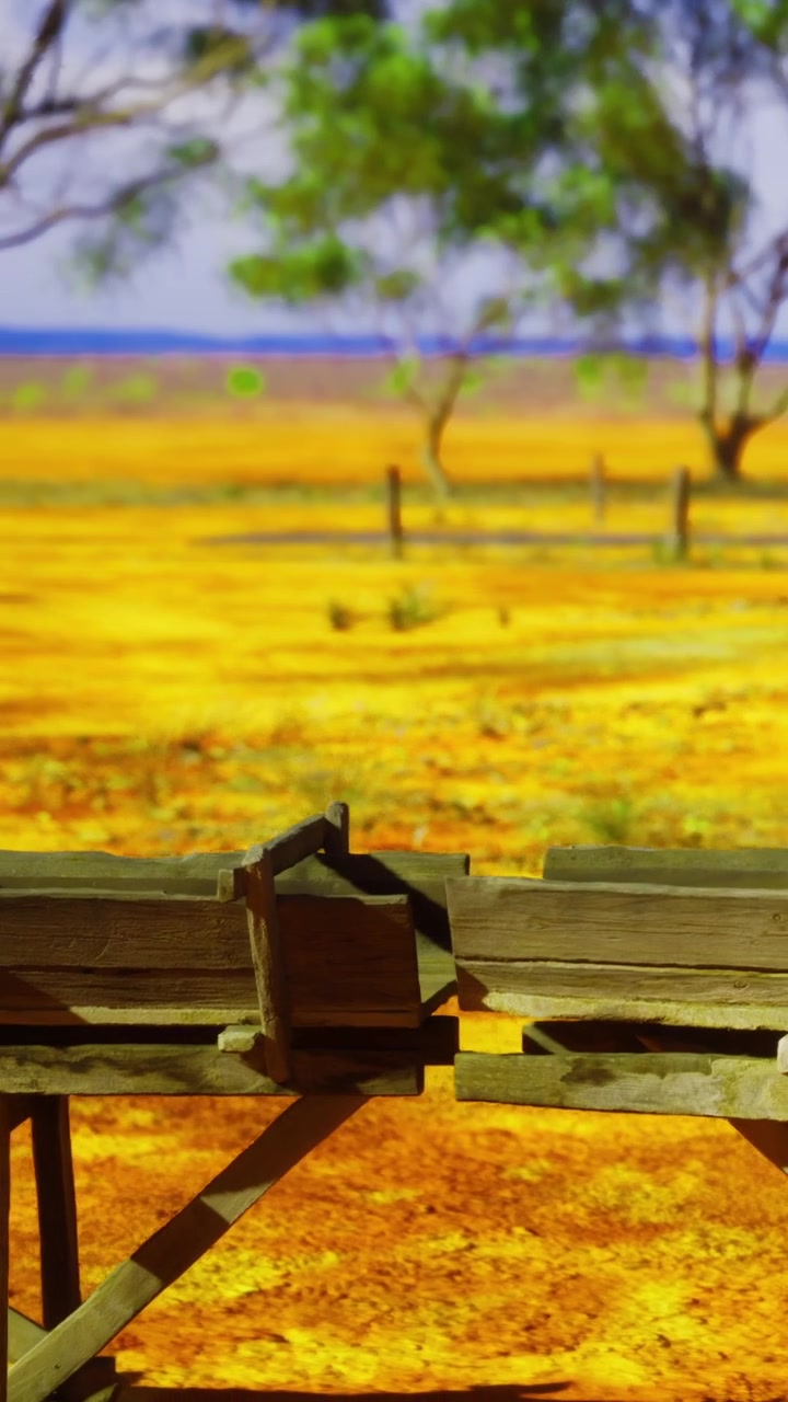 Structures en bois dans un paysage jaune près d'arbres pendant la journée