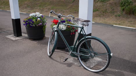 a vintage 1930s bicycle at a train station during world war two