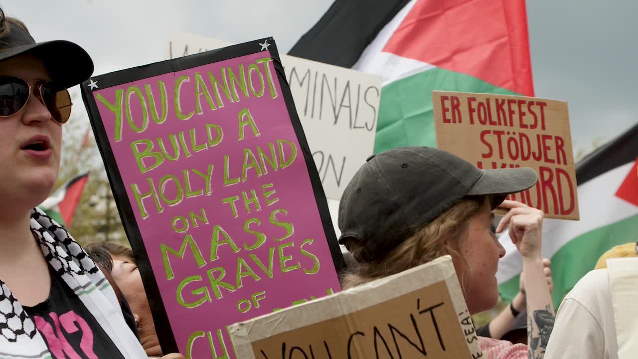 Pro Palestine protesters march against Israel’s Eurovision participation in Malmö (Sweden), calling for a ceasefire on the war in Gaza, Eurovision song contest 2024, handheld closeup shot