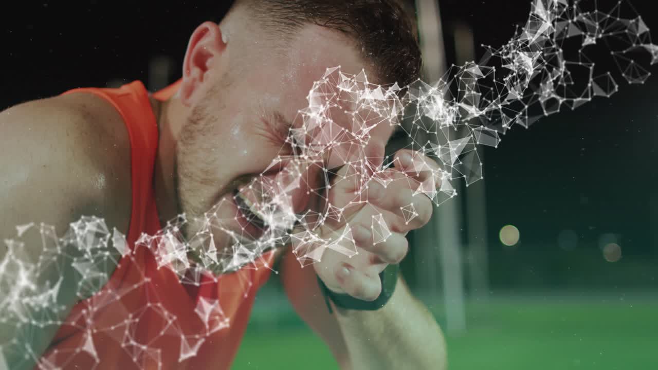 Man recovering post training, rubbing eyes and checking watch as particle mesh tracking vitals