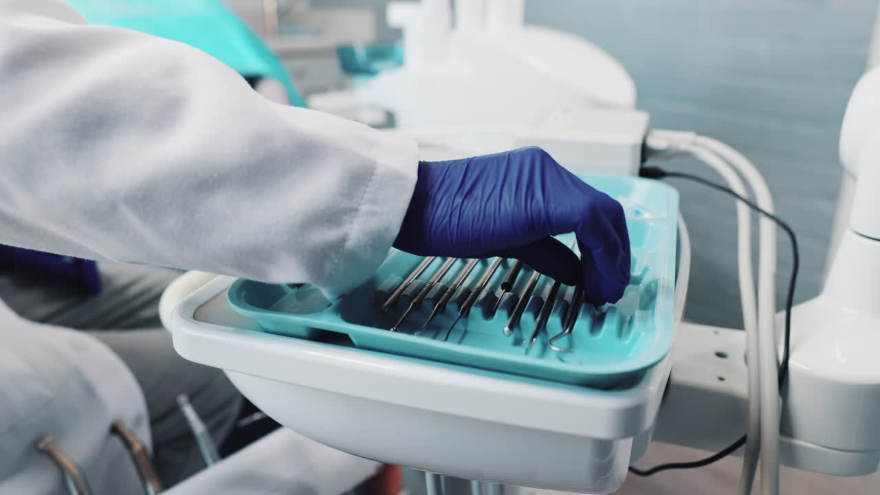 Dental instruments and patient in dentist office