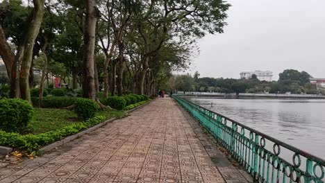 a peaceful walk along hanoi's lakeside path