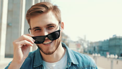 smiling man in sunglasses