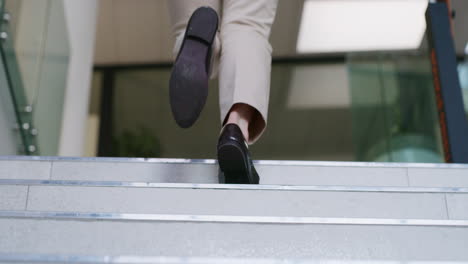 person walking up stairs