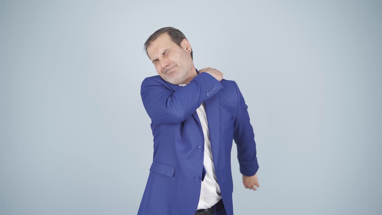 Businessman's shoulders hurt.