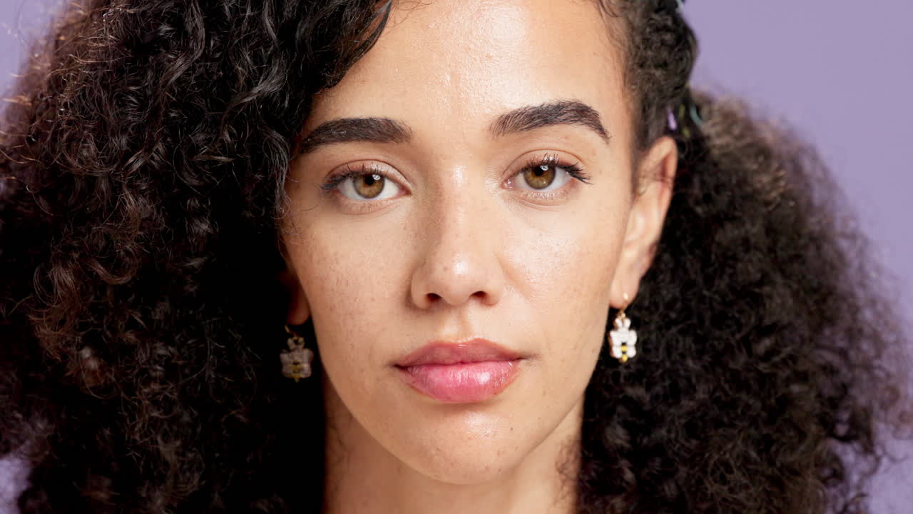 Portrait of a woman with curly hair