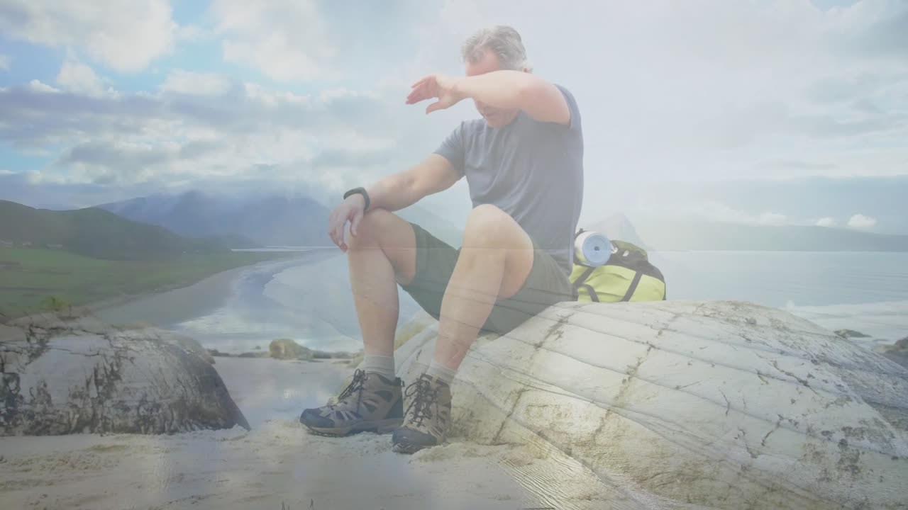 man wiping forehead resting on rock with backpack at coastal beach, showing animated health chart