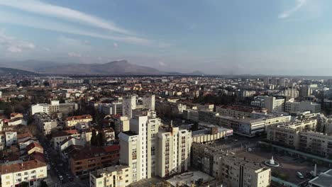 Aerial shot of  central Podgorica city, capital of Montenegro. Sunny and bright day with a blue sky.