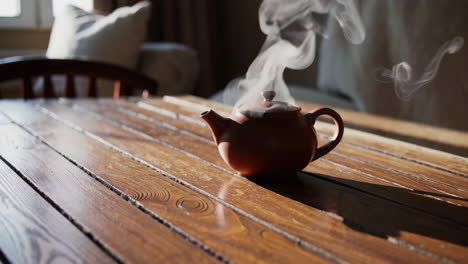 a teapot on a wooden table