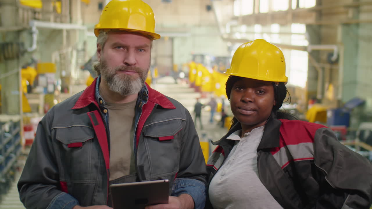 Portrait of Diverse Factory Workers with Tablet