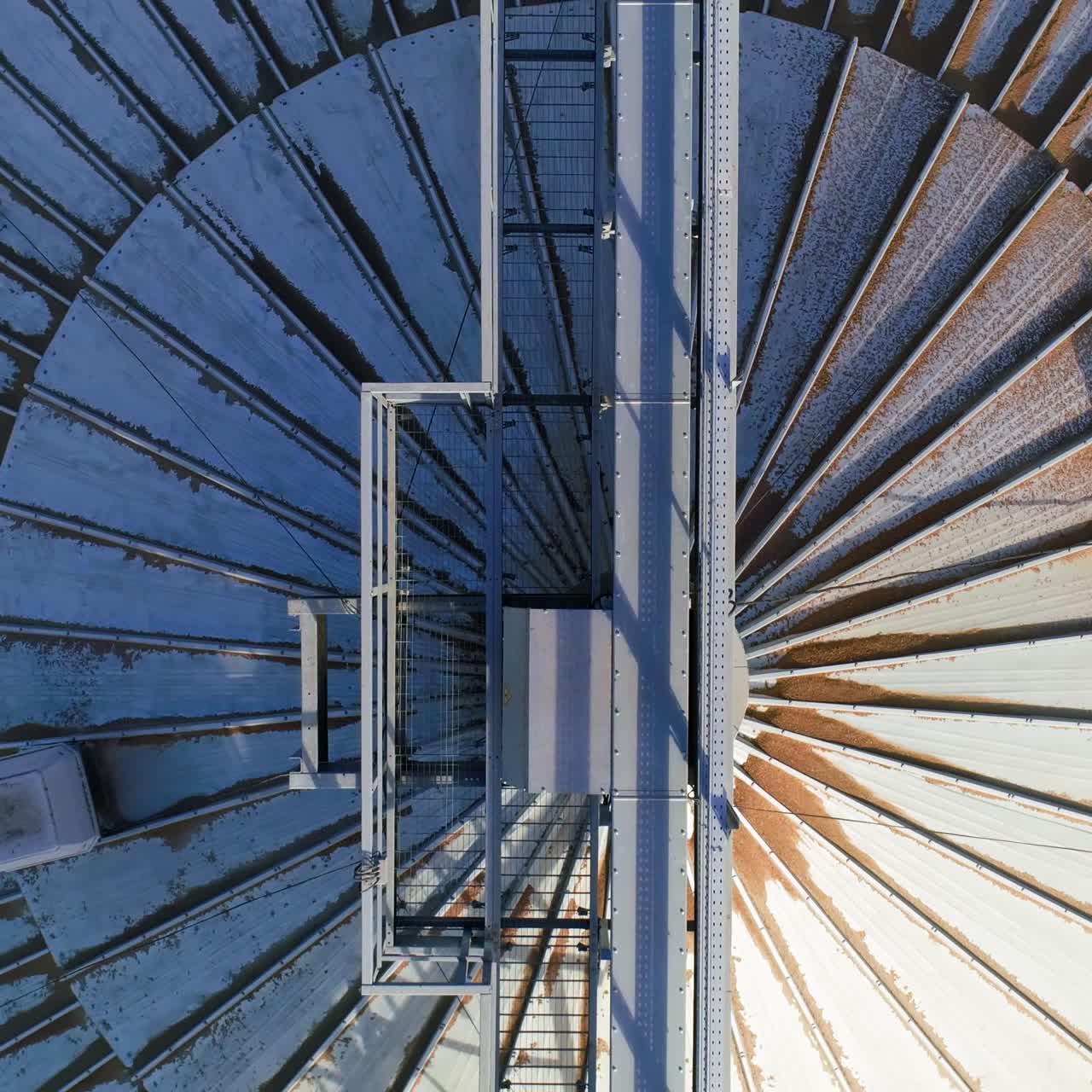 Farming elevator and granary. Storage of grain and other different cereals. Aerial view