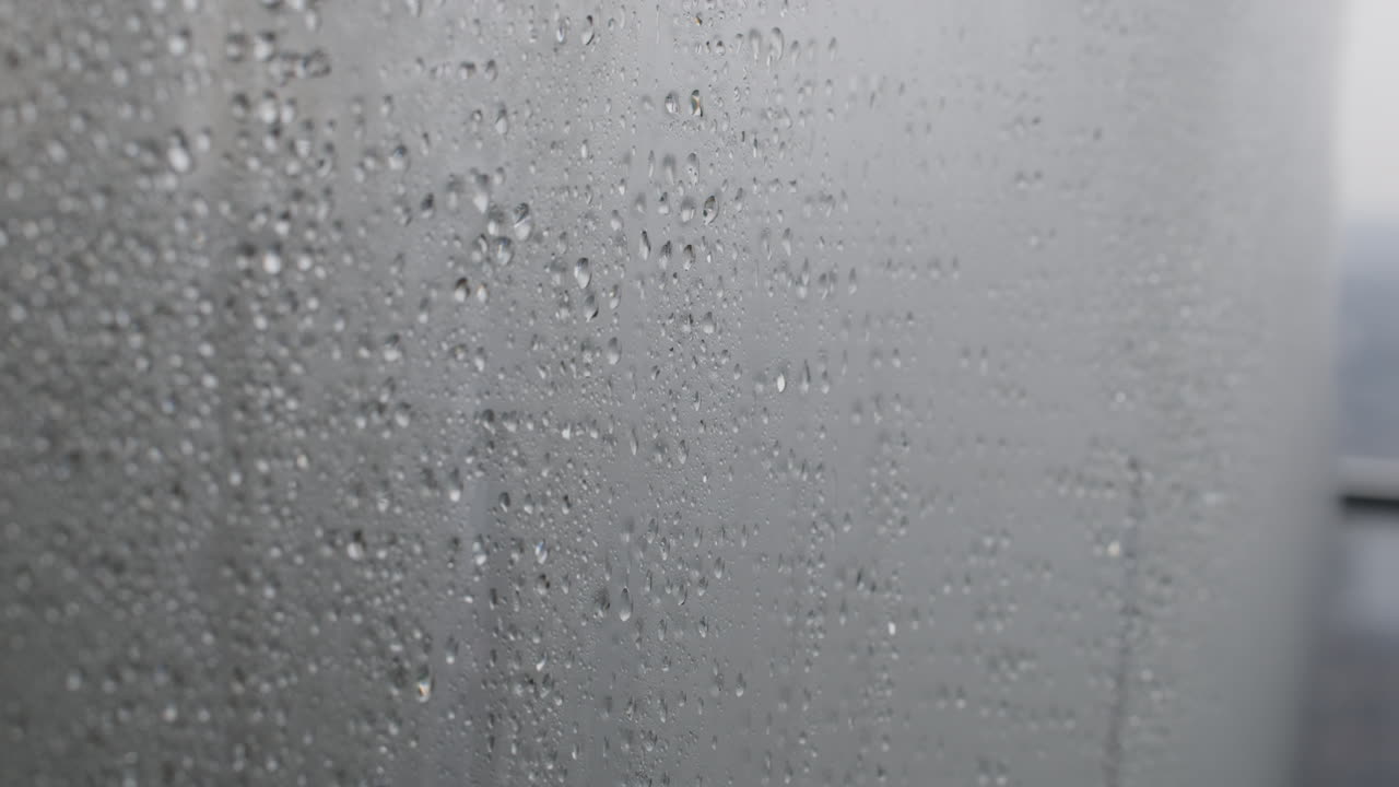 Water Droplets on a Fogged Window